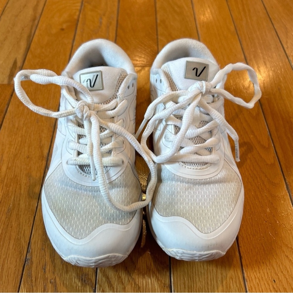 Size 1 white cheer shoes.